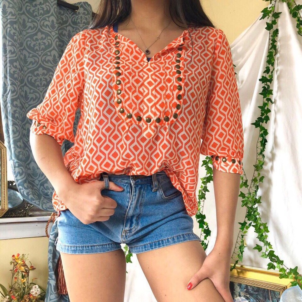 Orange studded flowy blouse